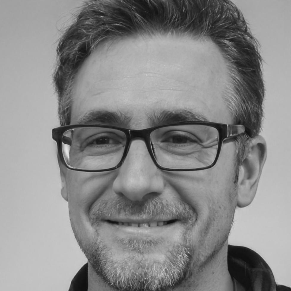 Software engineer Matthias reviewing system architecture documentation